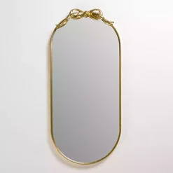 Kirklands Home Decorative Mirrors|Oval Gold Bow Metal Wall Mirror